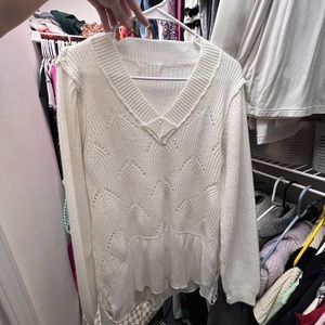 White sweater with distressed hem